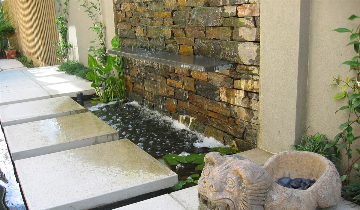 Stepping stones over waterfeature