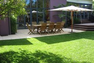 View of deck and Paved outdoor enterrtaining area