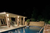 View of pool at night