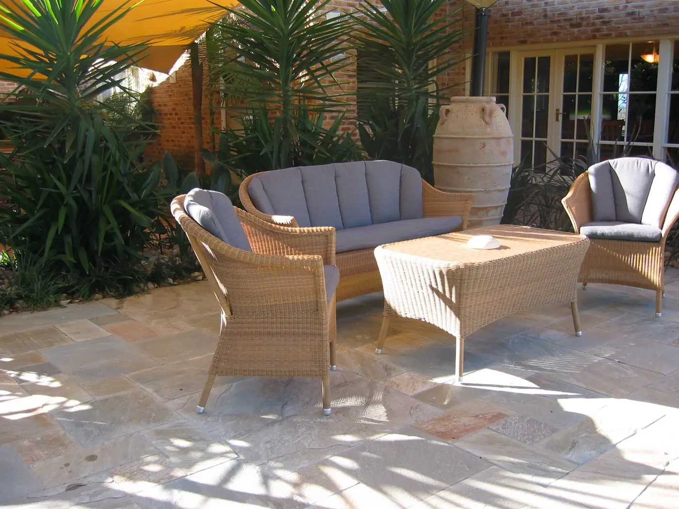 View of outdoor seating area with Cobb & Co Paving