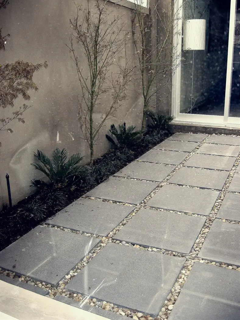 Stepping stone style paving in side courtyard